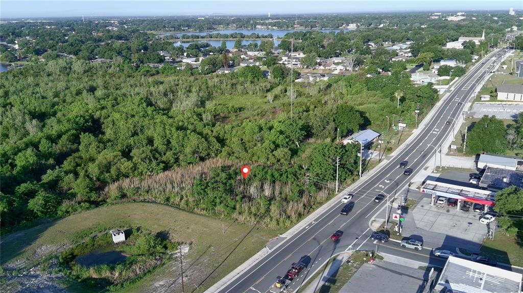Dundee Road Winter Haven, FL 33884 - Photo 5 of 6 an aerial view of residential houses with outdoor space