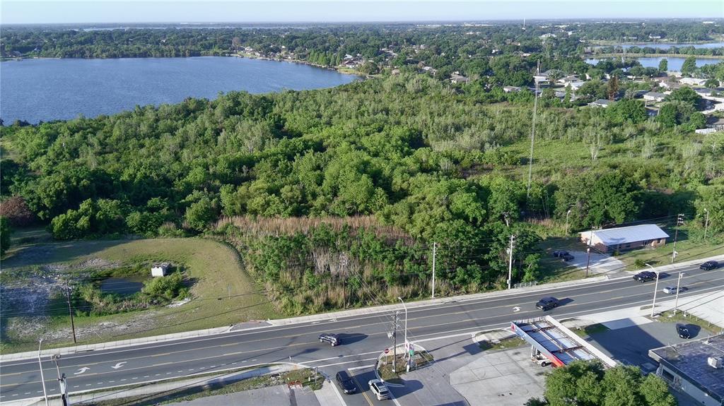 Dundee Road Winter Haven, FL 33884 - Photo 6 of 6 an aerial view of a residential houses with outdoor space and trees