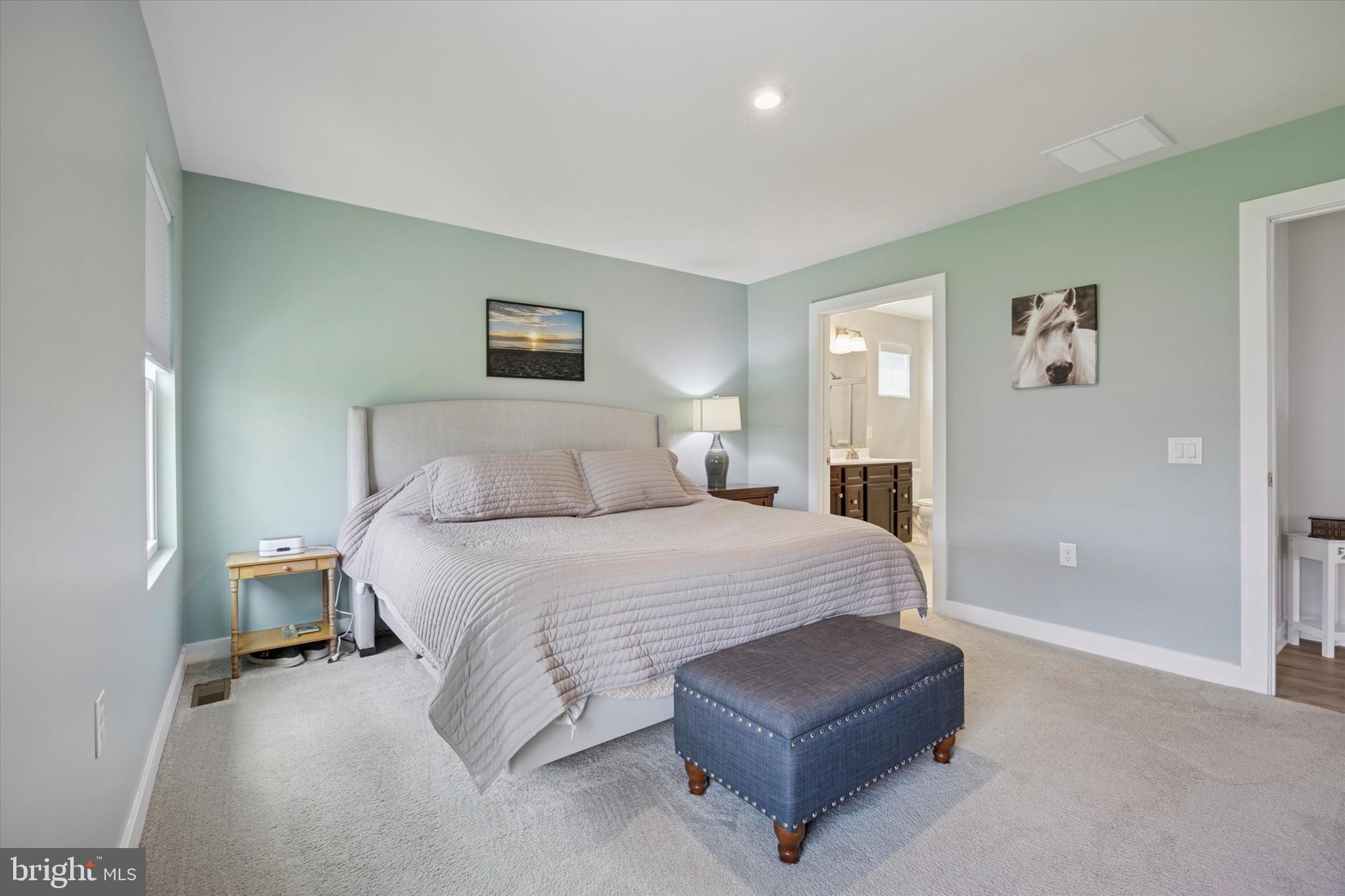 7 Senators Way Berlin, NJ 08009 - Photo 13 of 25 a bedroom with a bed and a couch