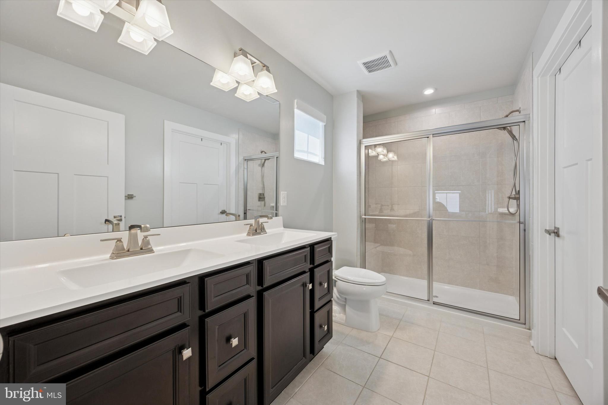 7 Senators Way Berlin, NJ 08009 - Photo 14 of 25 a spacious bathroom with a double vanity sink mirror double and shower