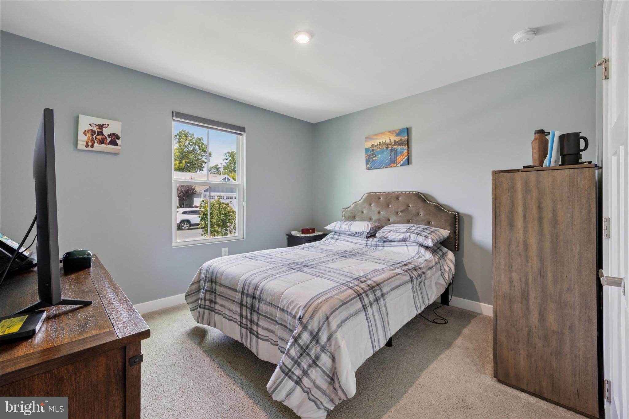 7 Senators Way Berlin, NJ 08009 - Photo 17 of 25 a bedroom with a bed and a window