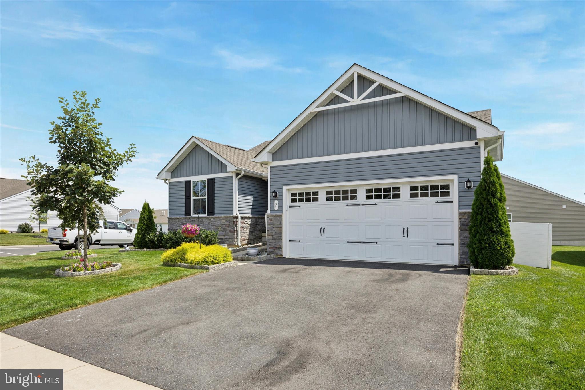 7 Senators Way Berlin, NJ 08009 - Photo 2 of 25 a view of a house with yard and garage