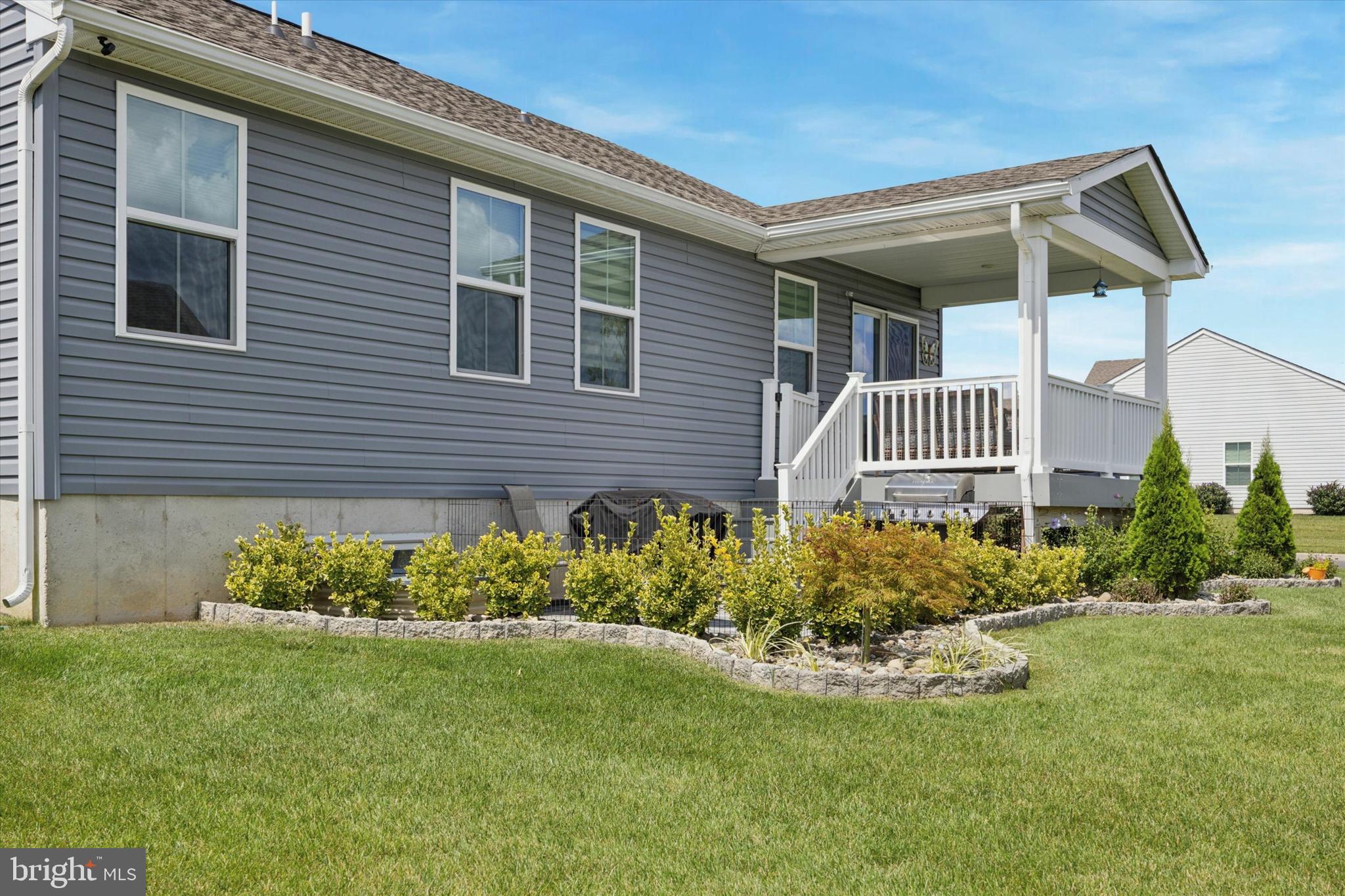 7 Senators Way Berlin, NJ 08009 - Photo 25 of 25 a front view of a house with garden