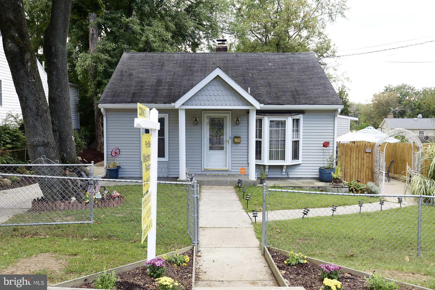 12110 Selfridge Road Silver Spring, MD 20906 - Photo 1 of 26 a house view with a garden space
