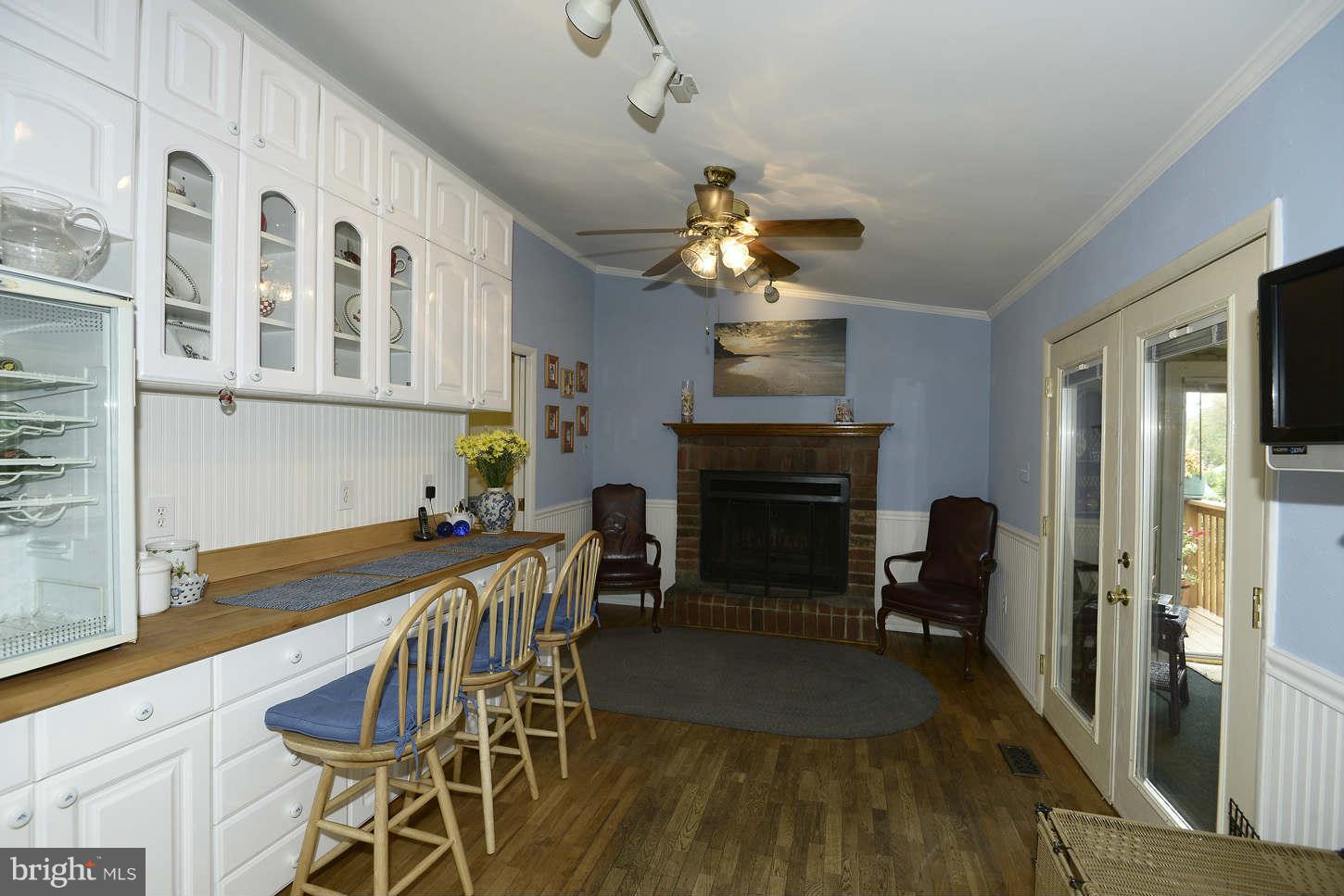12110 Selfridge Road Silver Spring, MD 20906 - Photo 13 of 26 a view of a dining room with furniture and chandelier
