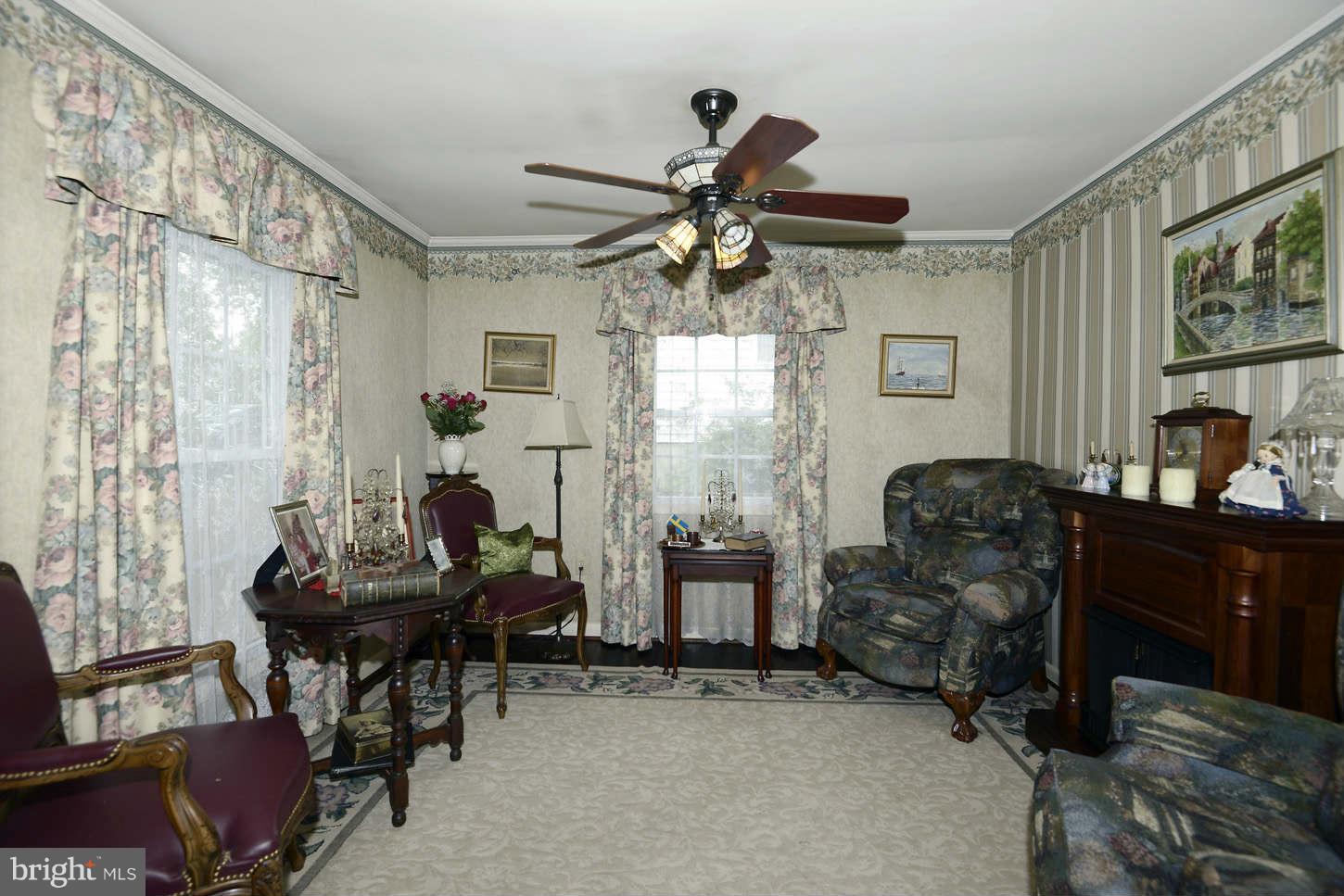 12110 Selfridge Road Silver Spring, MD 20906 - Photo 7 of 26 a living room with furniture