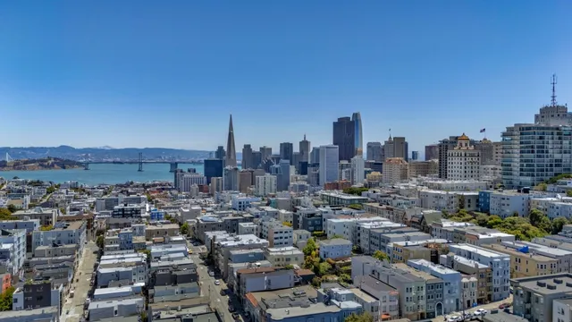 a view of a city with tall buildings