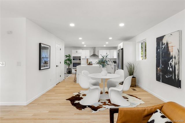 a view of a dining room with furniture