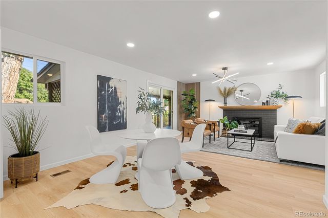 a kitchen with stainless steel appliances a sink stove and cabinets