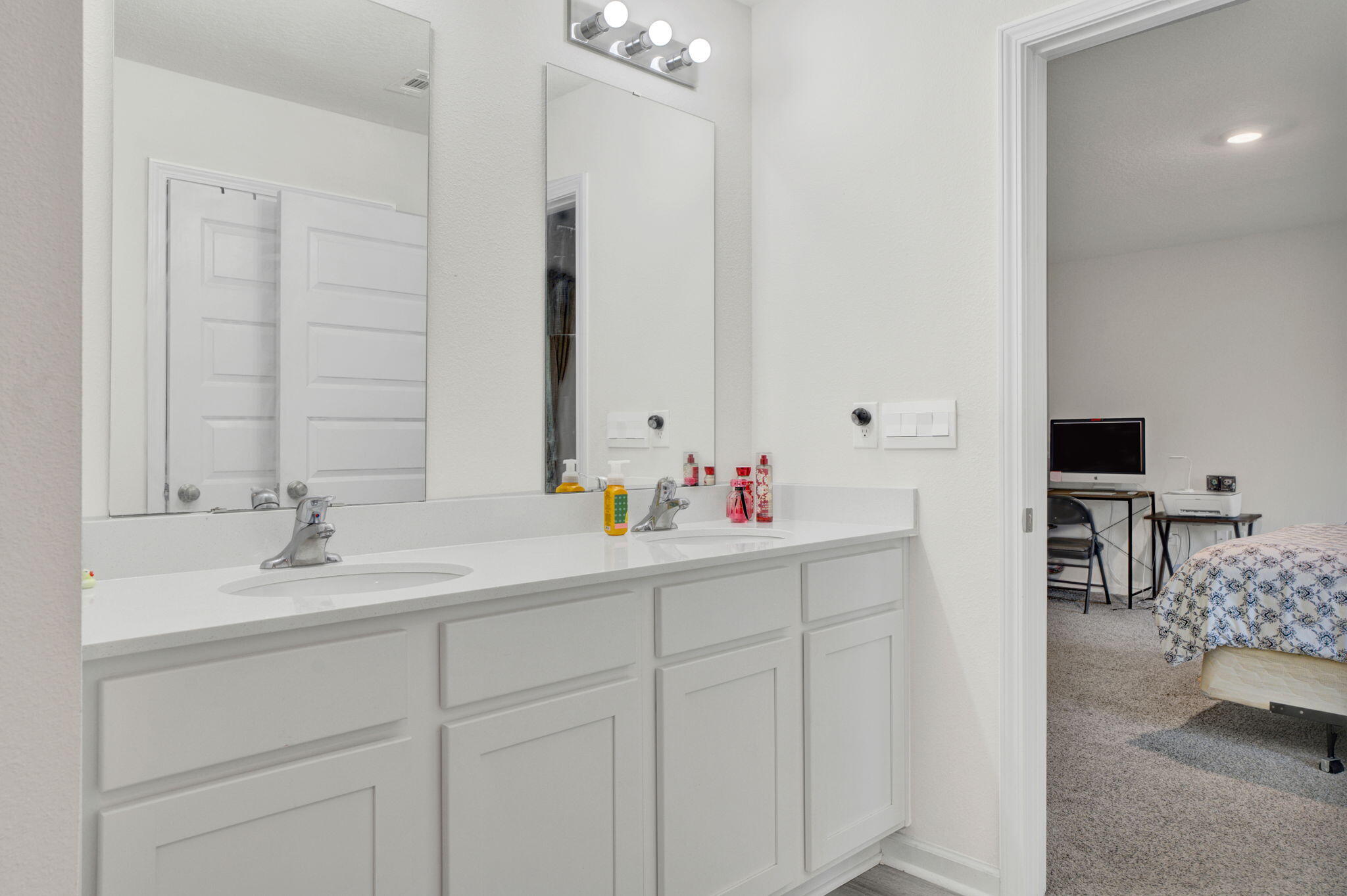535 Mary Lou Way Crestview, FL 32539 - Photo 11 of 37 a bathroom with a sink and a mirror
