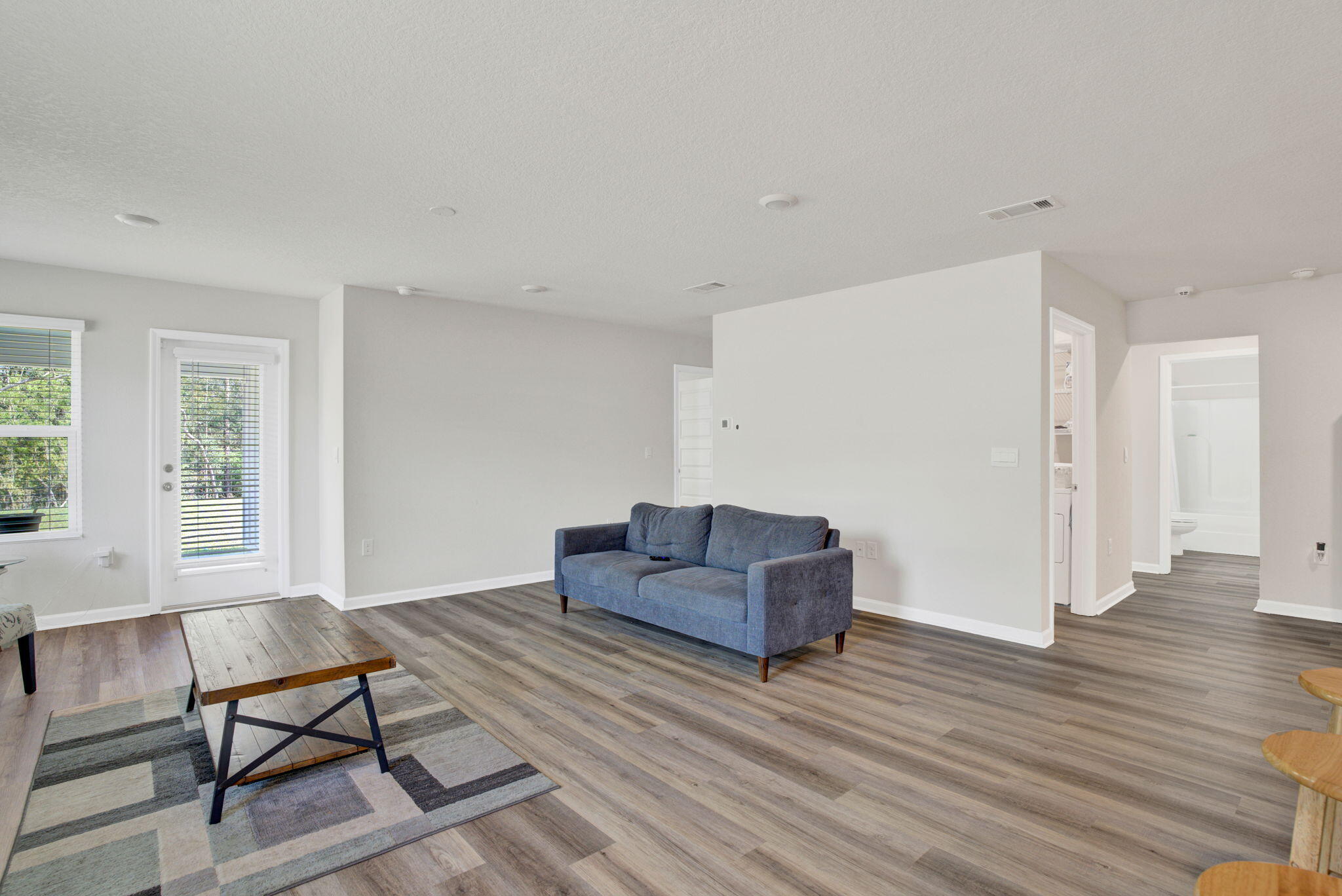 535 Mary Lou Way Crestview, FL 32539 - Photo 17 of 37 a living room with furniture and a wooden floor