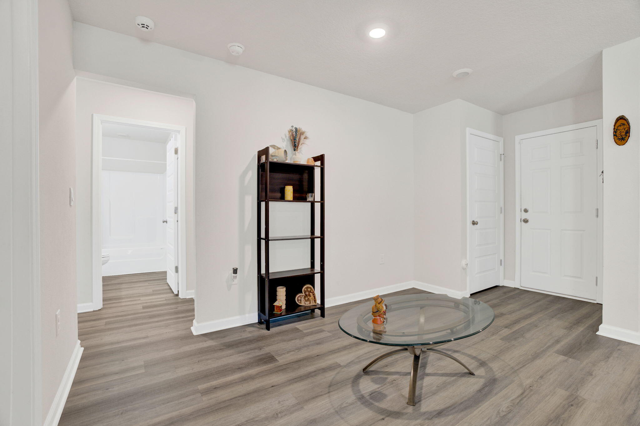 535 Mary Lou Way Crestview, FL 32539 - Photo 19 of 37 a view of a room with wooden floor and bathroom