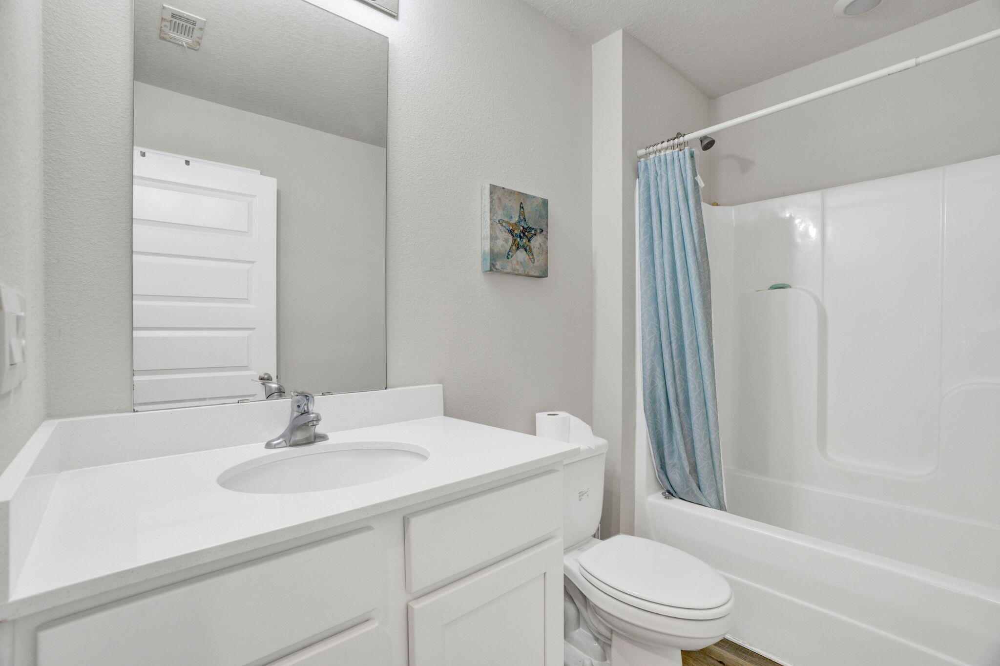 535 Mary Lou Way Crestview, FL 32539 - Photo 21 of 37 a bathroom with a sink toilet and shower