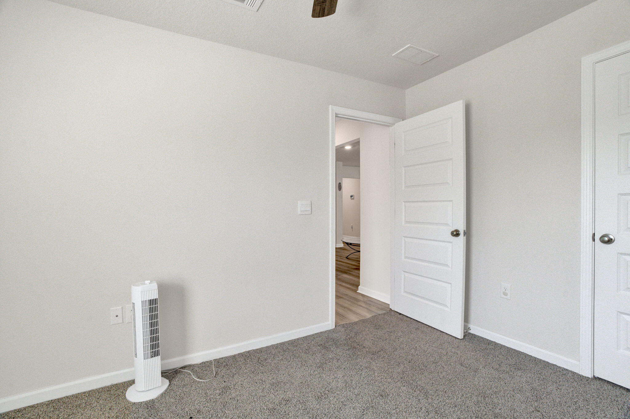 535 Mary Lou Way Crestview, FL 32539 - Photo 24 of 37 an empty room with a door