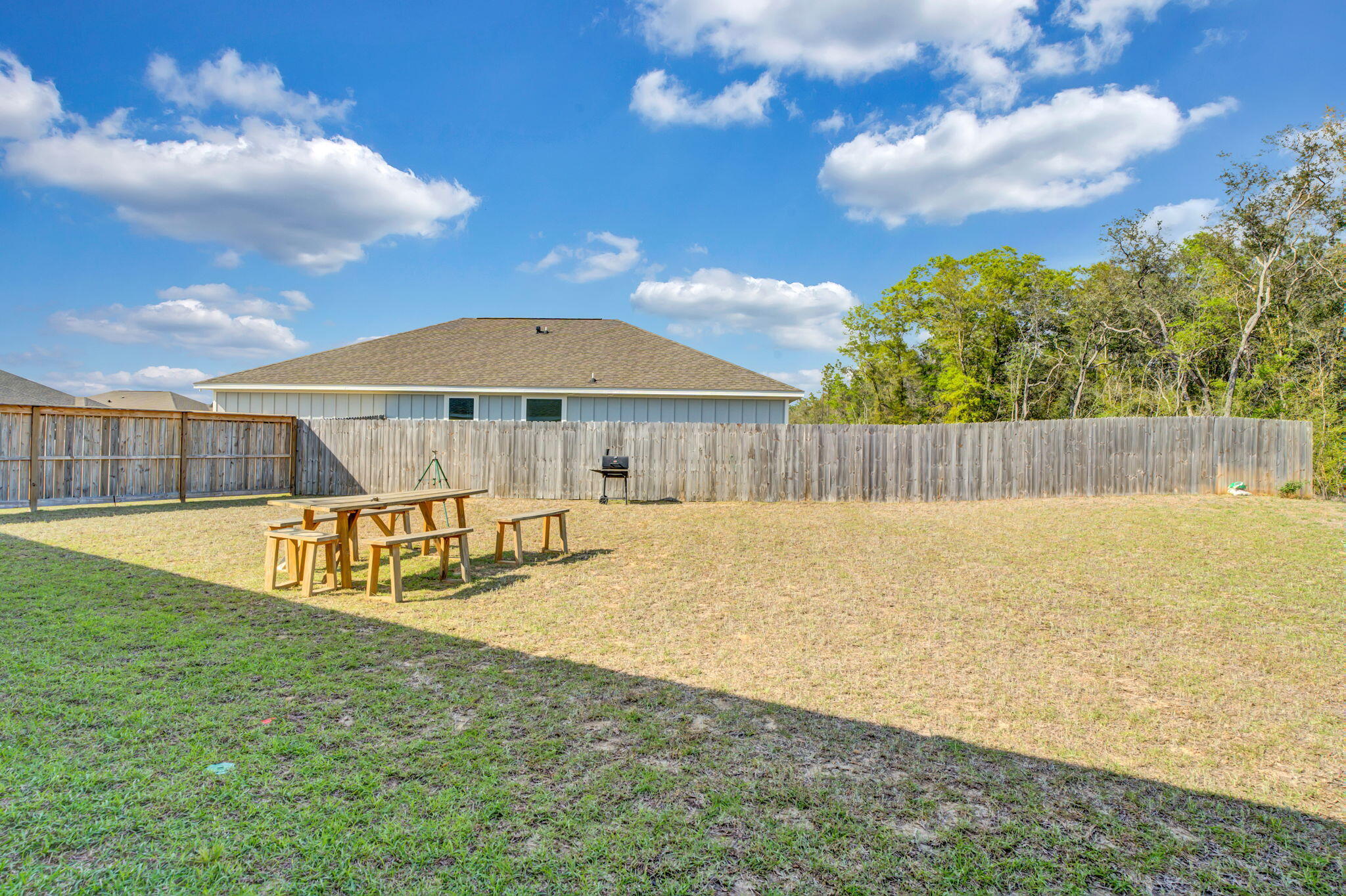 535 Mary Lou Way Crestview, FL 32539 - Photo 30 of 37 a view of a house with swimming pool and sitting area