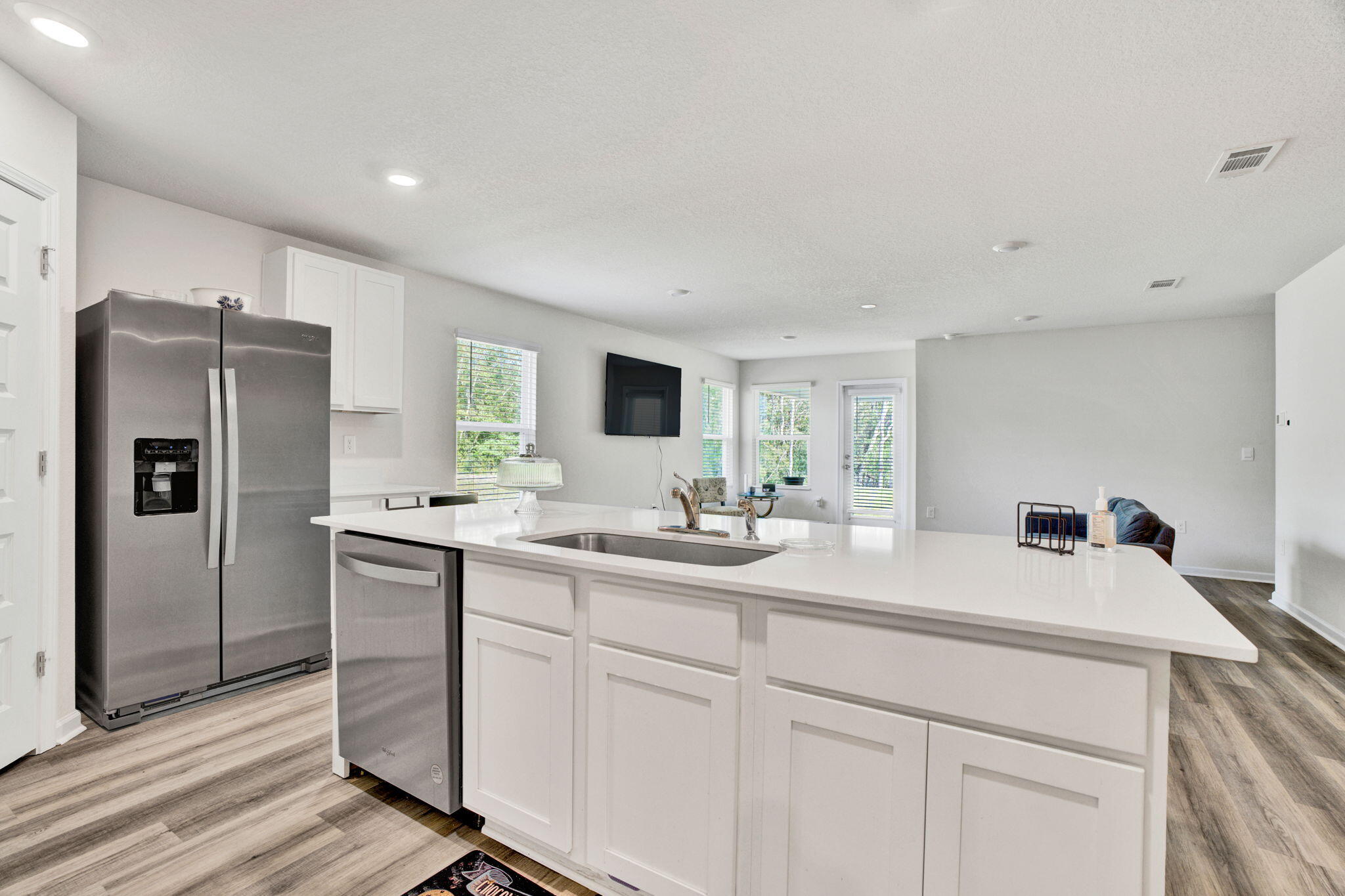 535 Mary Lou Way Crestview, FL 32539 - Photo 5 of 37 a kitchen with a sink and refrigerator