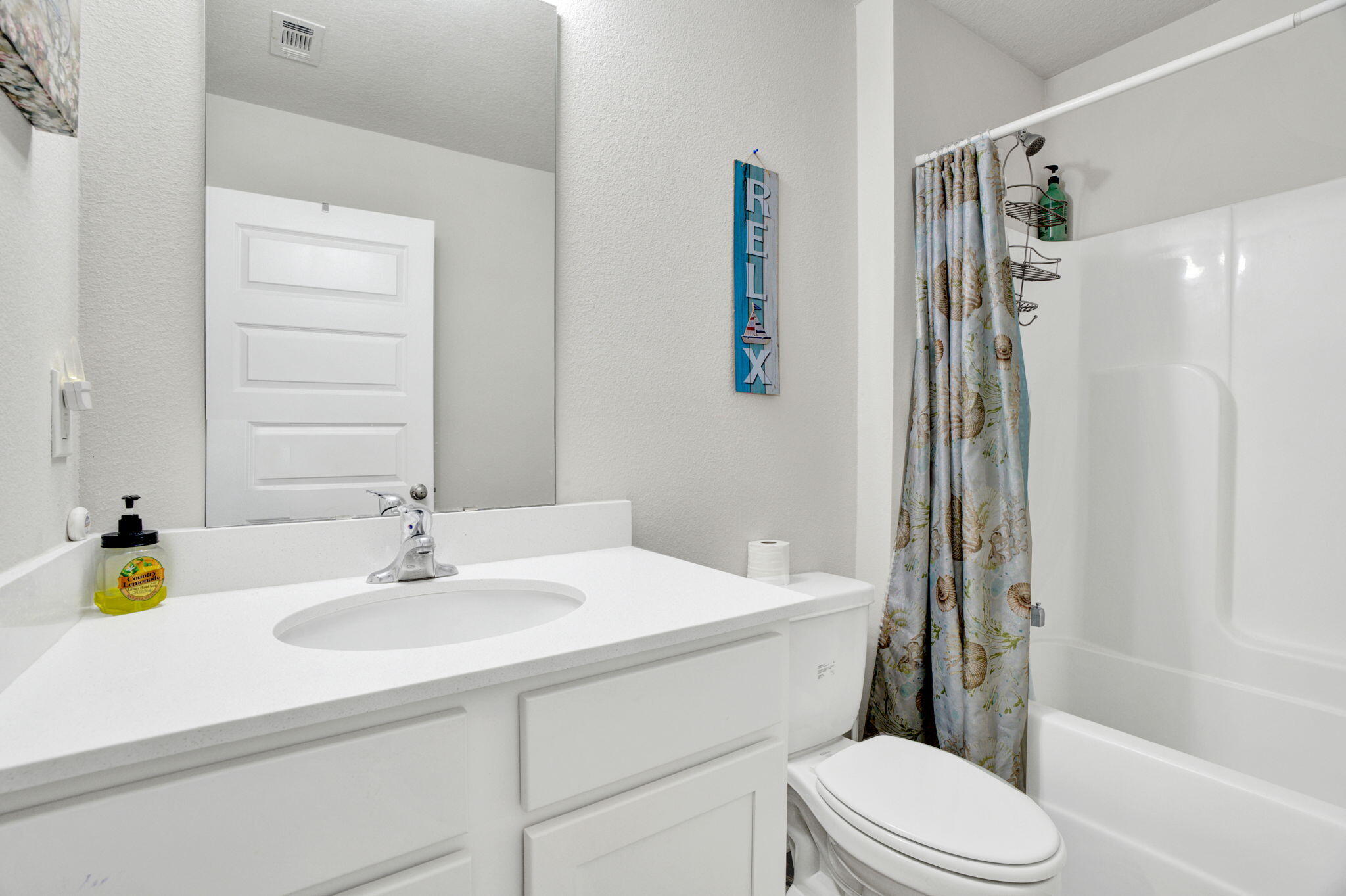 535 Mary Lou Way Crestview, FL 32539 - Photo 10 of 37 a bathroom with a sink toilet and shower