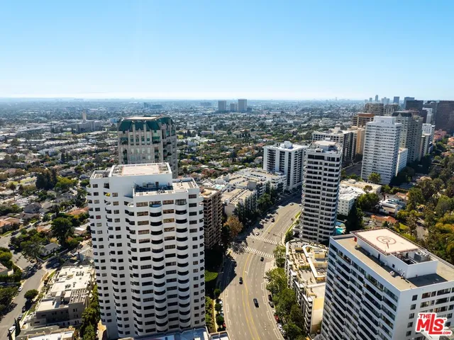 a view of a city with tall buildings