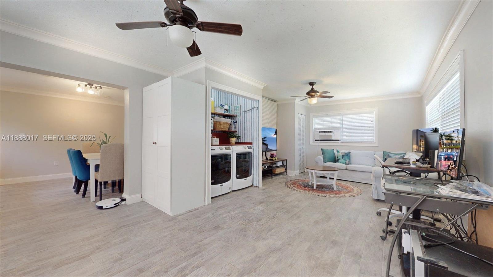 18475 Southwest 204th Street Miami, FL 33187 - Photo 20 of 41 a view of a livingroom with furniture and a ceiling fan