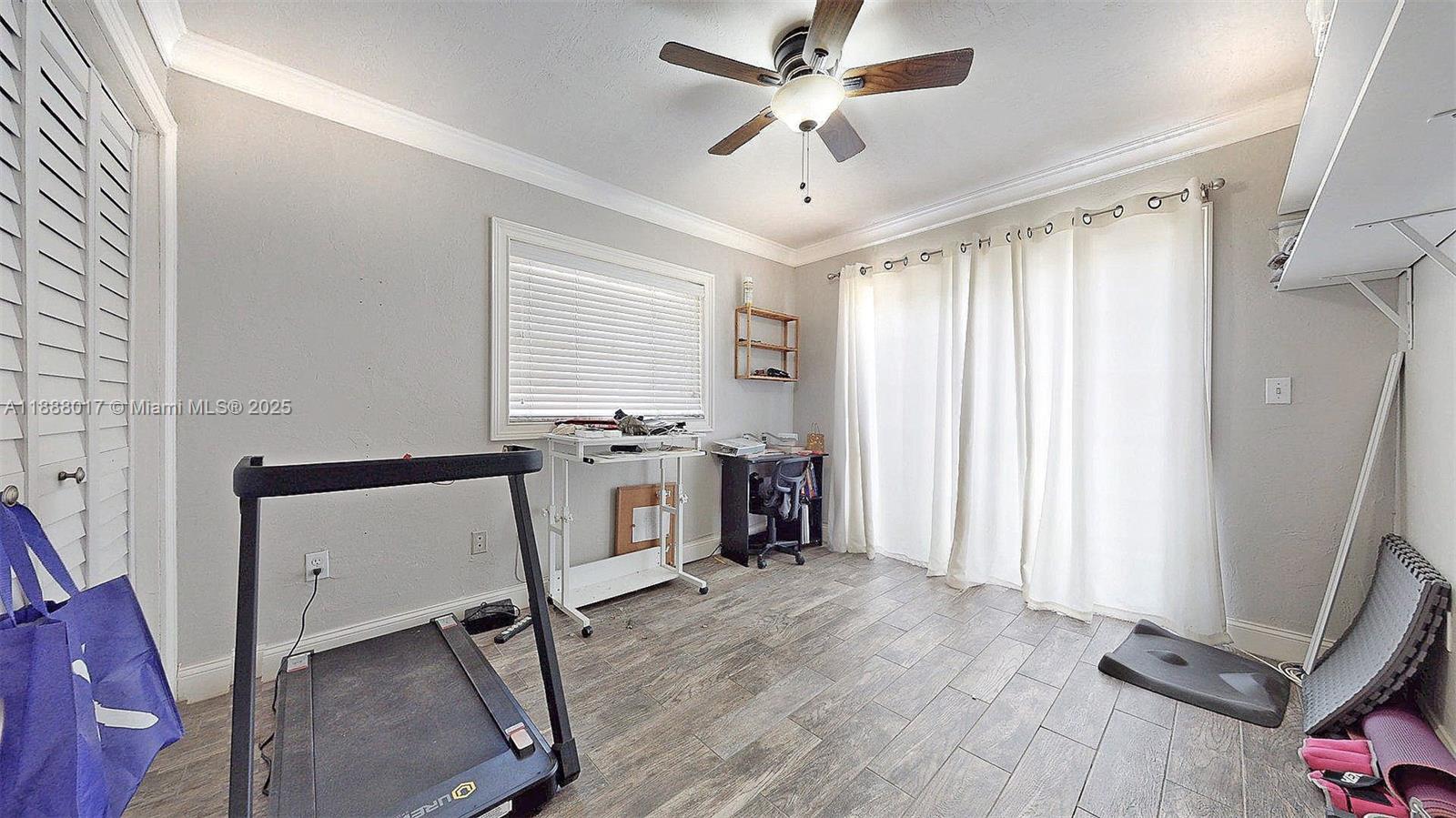 18475 Southwest 204th Street Miami, FL 33187 - Photo 28 of 41 a view of workspace with furniture and windows