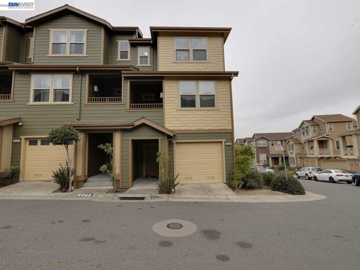 6067 Old Quarry Loop Oakland, CA 94605 - Photo 1 of 1 a view of multiple houses with a street