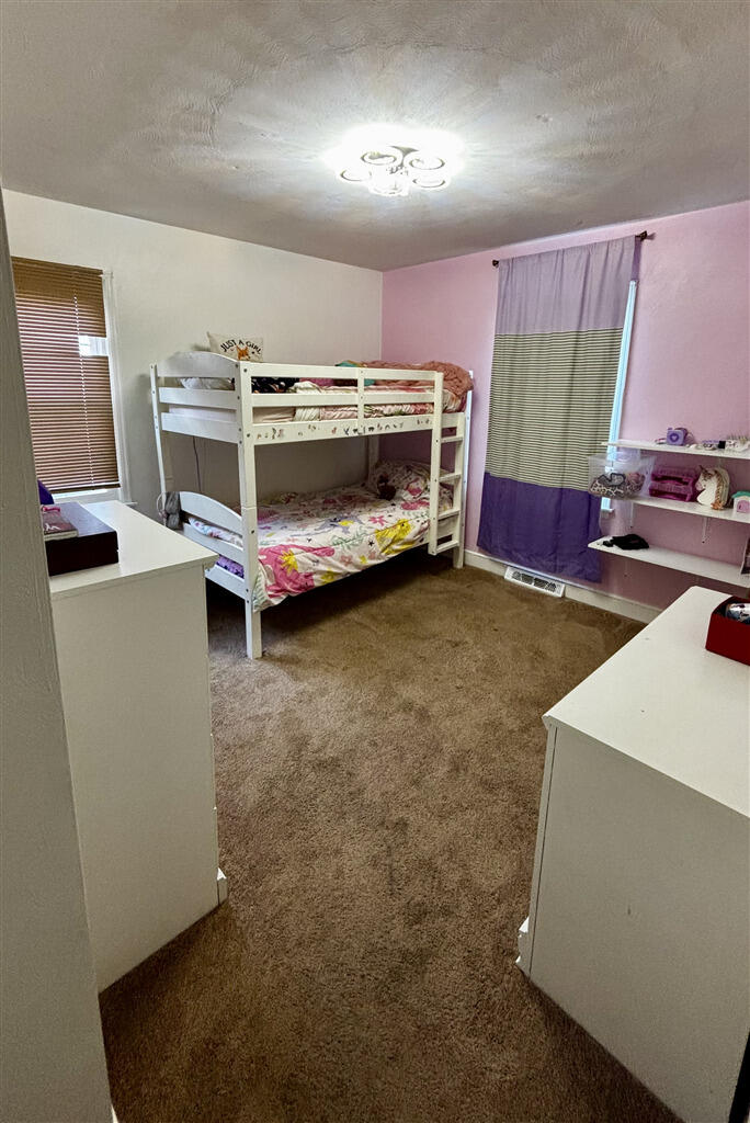 1032 Windy Ridge Drive Bedford, VA 24523 - Photo 15 of 27 a room with furniture and a flat screen tv