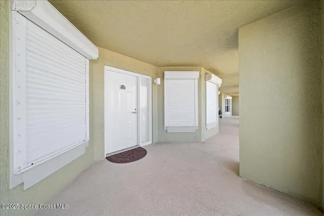 a view of a livingroom with wooden floor