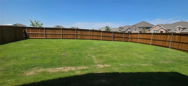 a view of a yard with a outdoor space