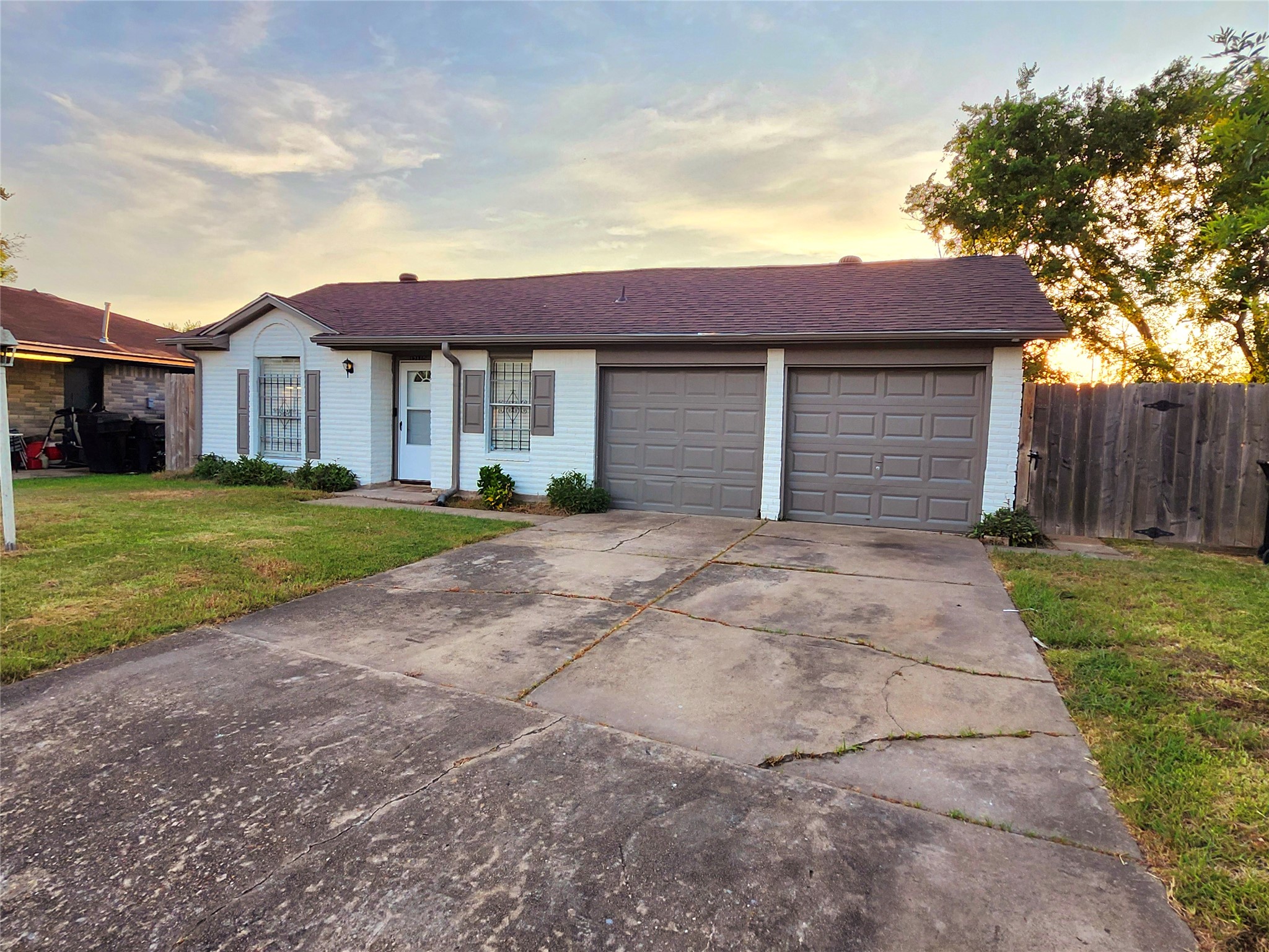 12110 Murr Way Houston, TX 77048 - Photo 2 of 24 a view of a house with a yard