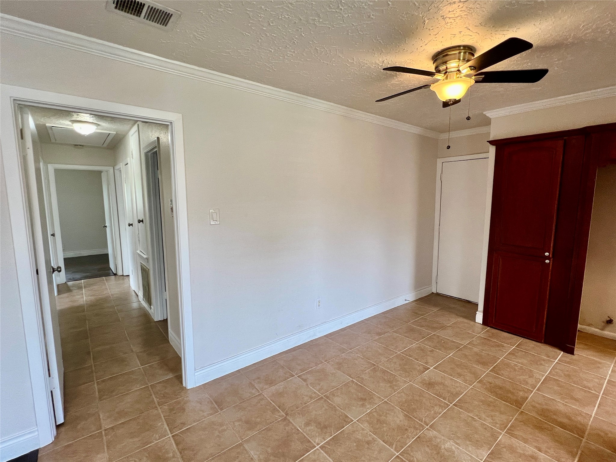 12110 Murr Way Houston, TX 77048 - Photo 6 of 24 a view of an empty room with a ceiling fan