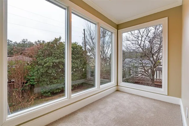 a view of a room with a large window
