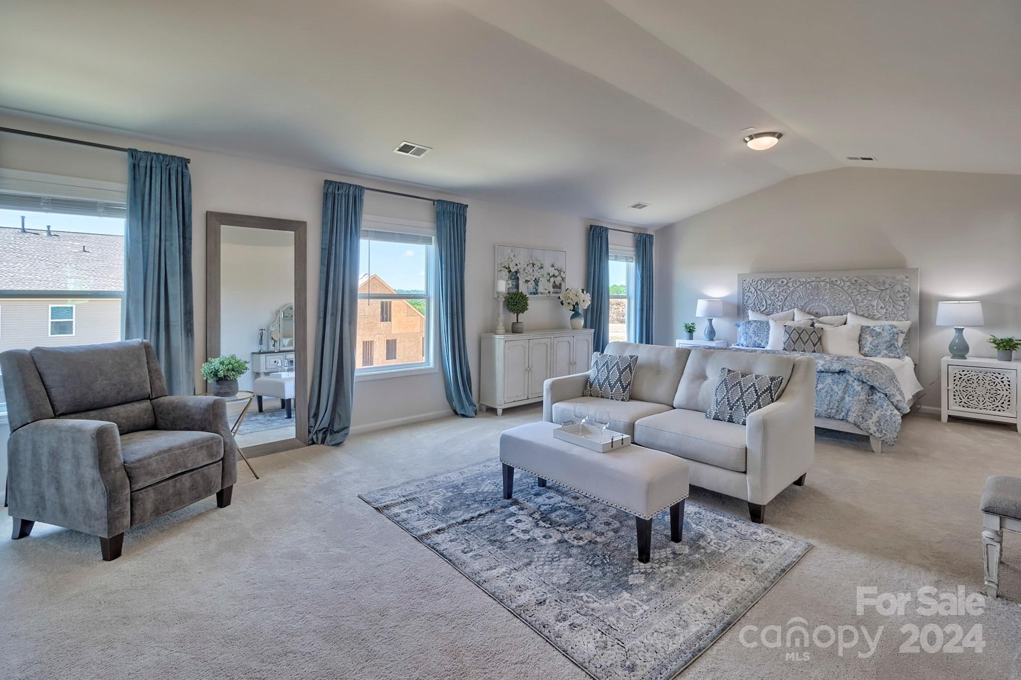 6504 Alanbrook Road, Unit 63 Charlotte, NC 28215 - Photo 24 of 25 a living room with furniture and a couch