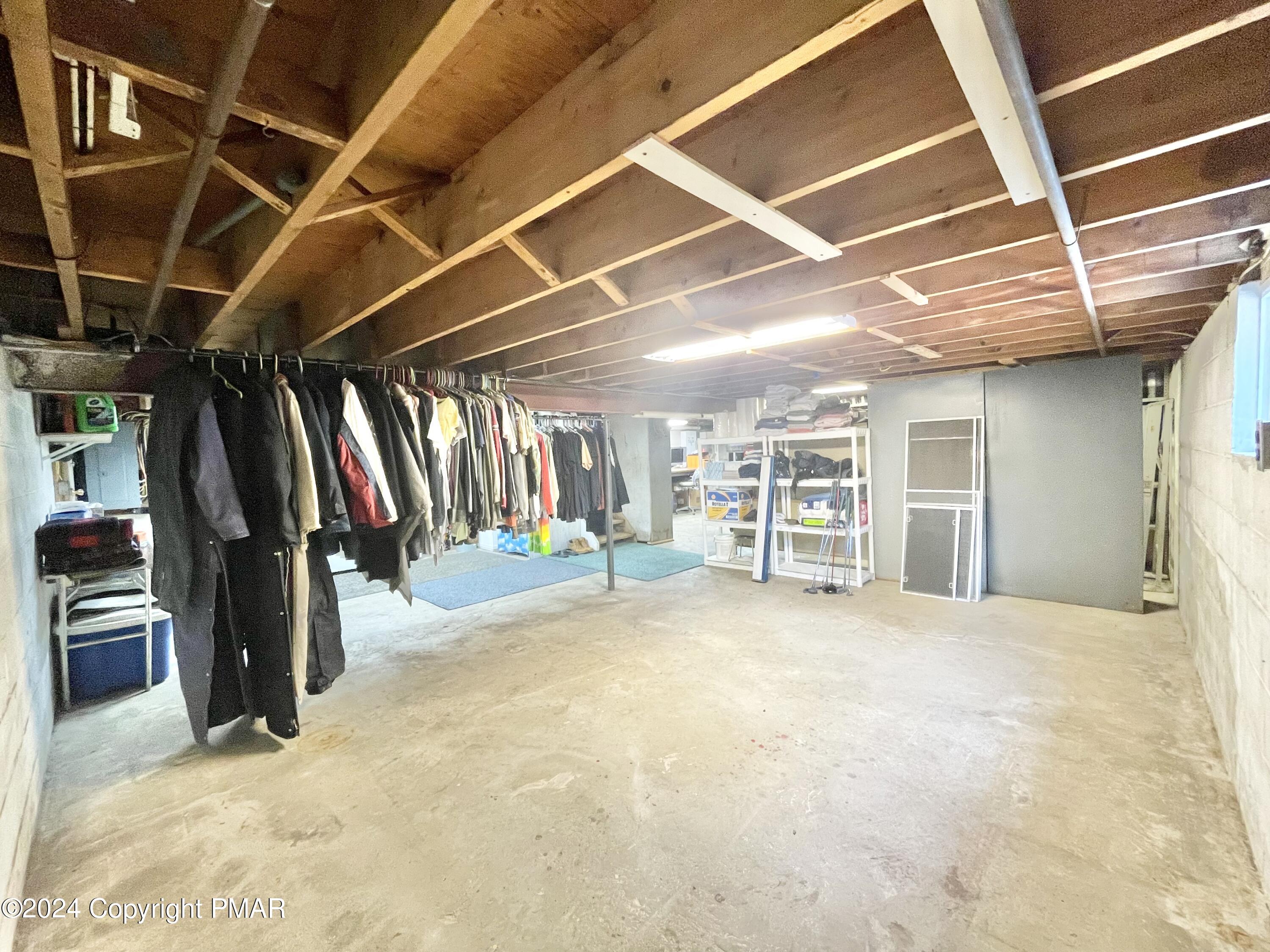 214 Shine Hill Road Henryville, PA 18332 - Photo 116 of 126 a view of an empty room with storage