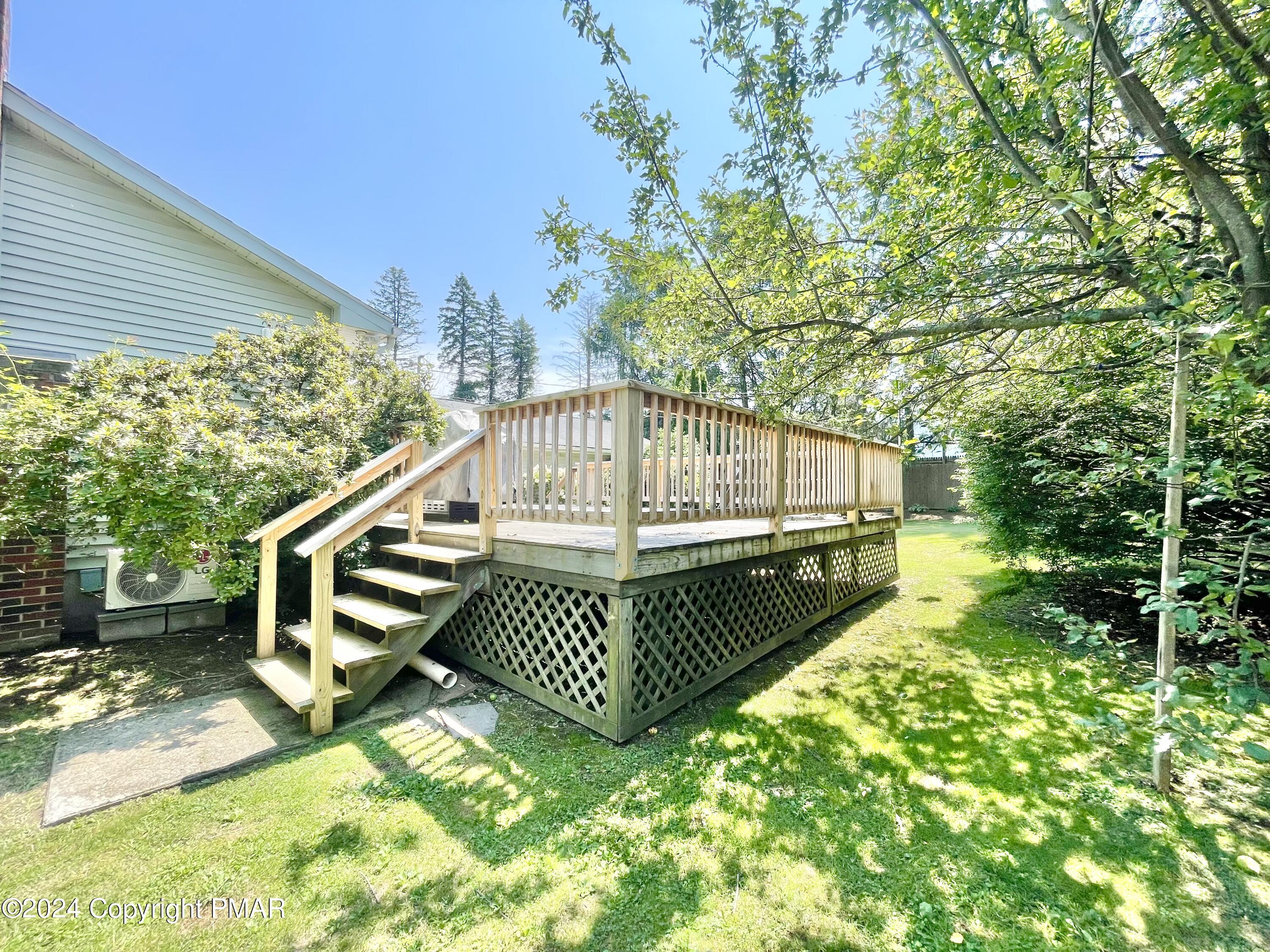 214 Shine Hill Road Henryville, PA 18332 - Photo 56 of 126 Back entrance to back yard deck