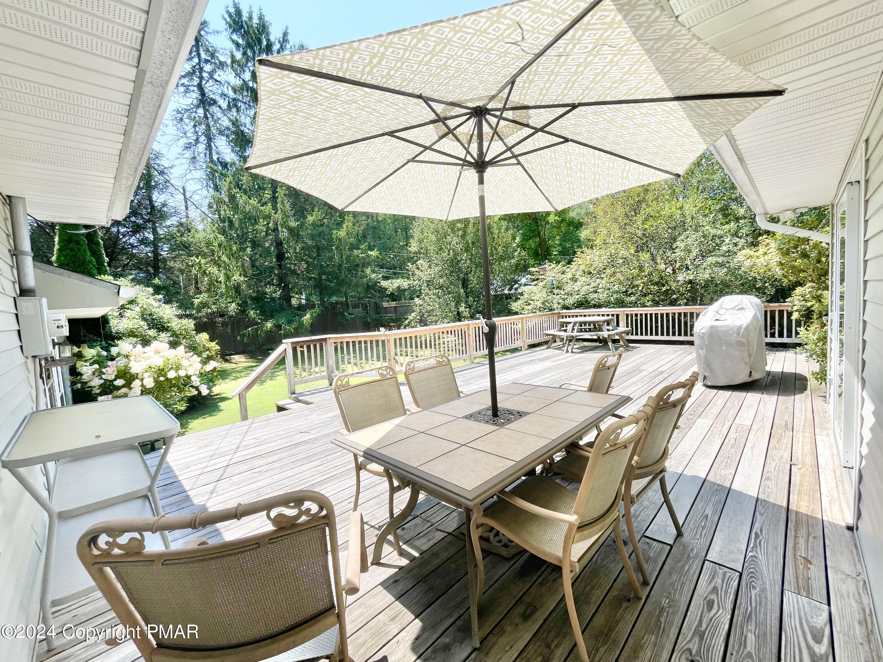 214 Shine Hill Road Henryville, PA 18332 - Photo 59 of 126 a view of a patio on the deck in front of house
