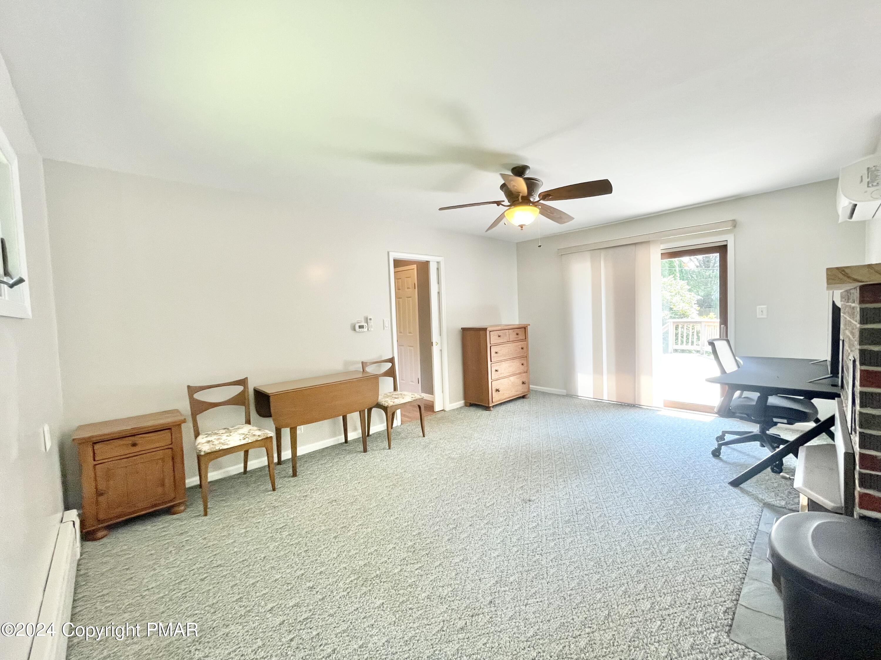 214 Shine Hill Road Henryville, PA 18332 - Photo 6 of 126 a living room with furniture and a window