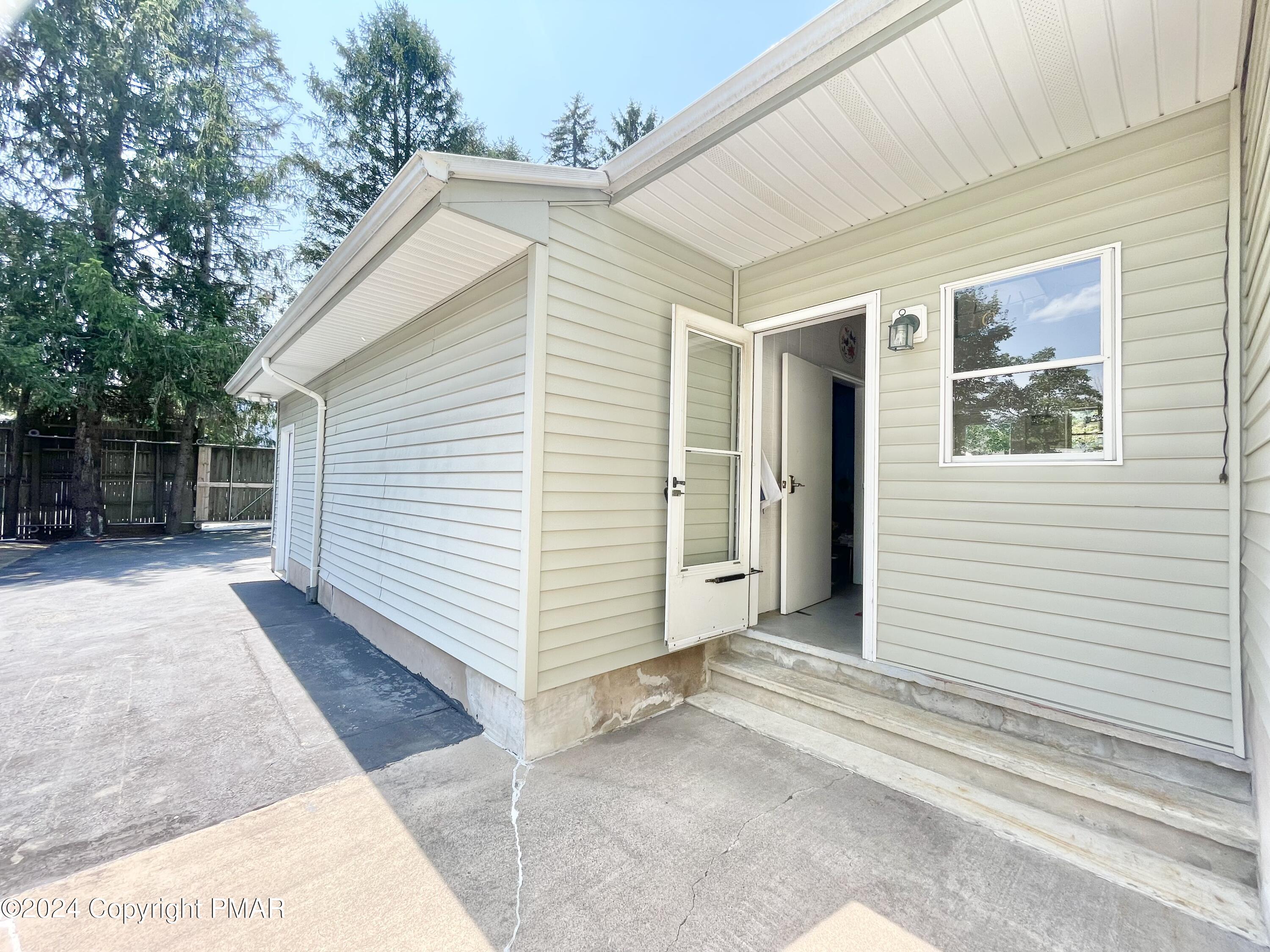 214 Shine Hill Road Henryville, PA 18332 - Photo 67 of 126 a view of a house with a yard