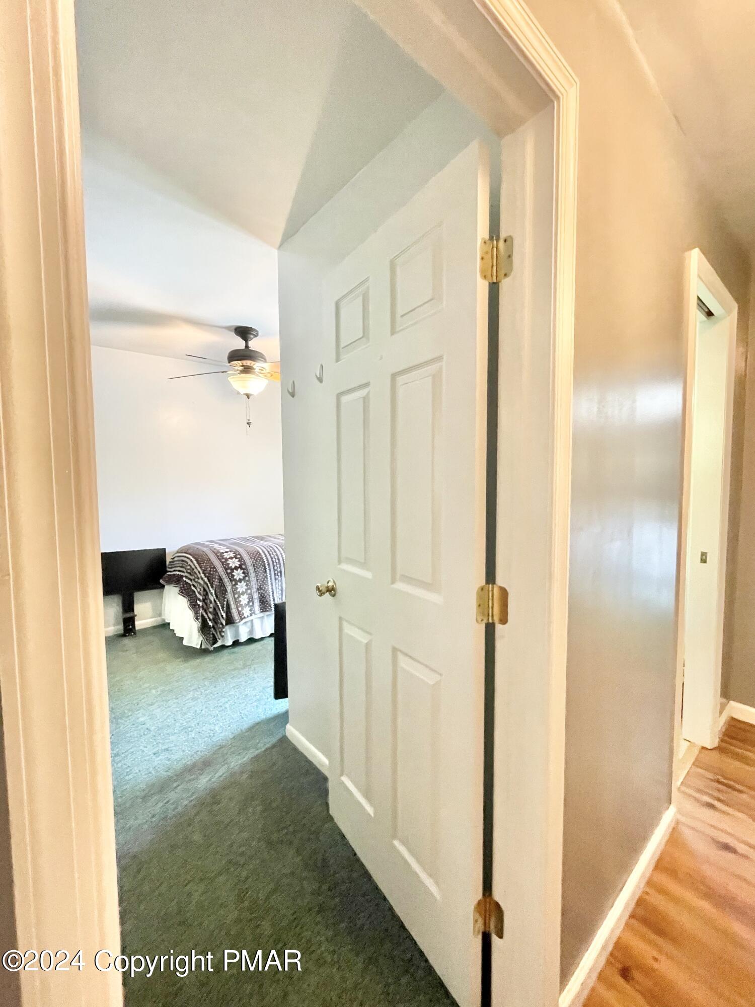 214 Shine Hill Road Henryville, PA 18332 - Photo 100 of 126 a view of a bedroom walk in closet and bedroom
