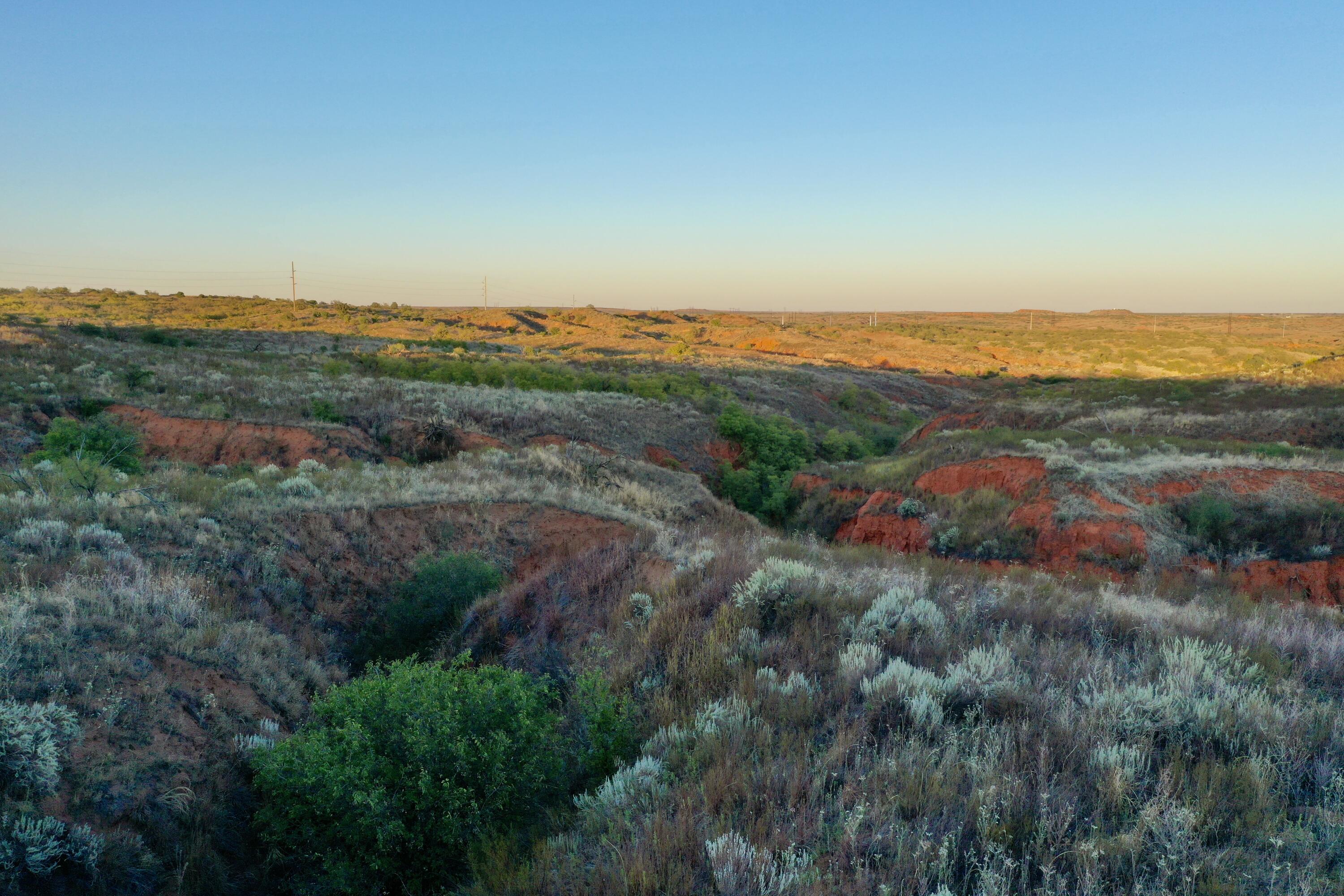 7 A Co Road Clarendon, TX 79226 - Photo 13 of 72 an aerial view of residential houses with outdoor space and trees