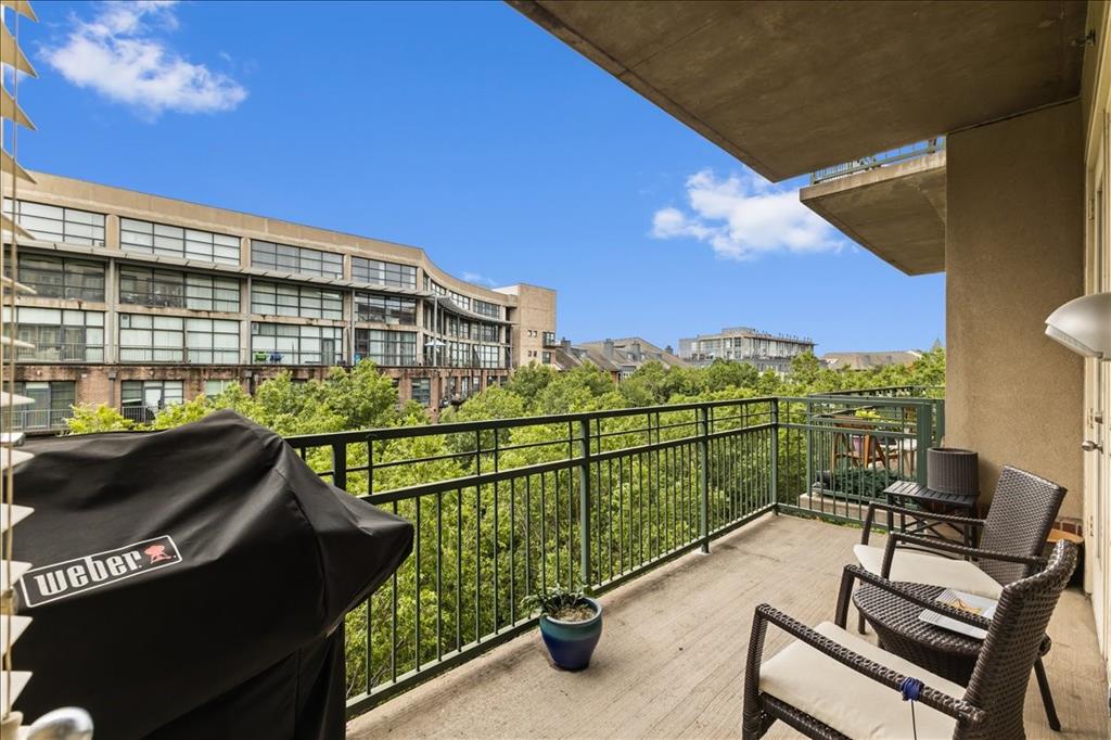 5055 Addison Circle, Unit 427 Addison, TX 75001 - Photo 25 of 35 a view of a balcony with chairs