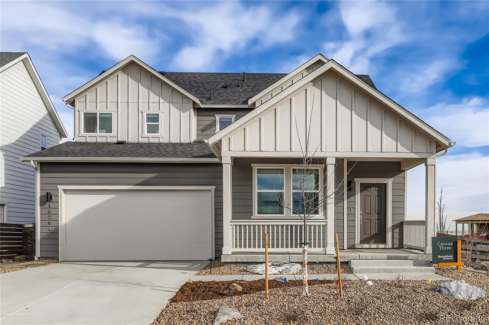 13322 Ladybug Lane Firestone, CO 80504 - Photo 2 of 22 a front view of a house with a porch