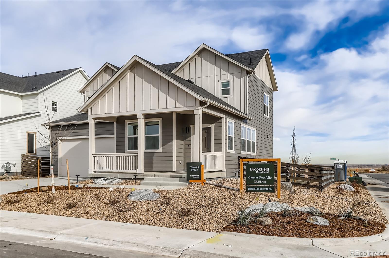 13322 Ladybug Lane Firestone, CO 80504 - Photo 3 of 22 a front view of a house with garden