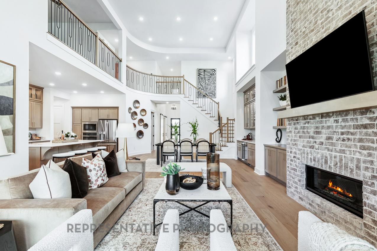 277 Leaning Rock Ridge Austin, TX 78737 - Photo 6 of 9 a living room with furniture a flat screen tv and a fireplace