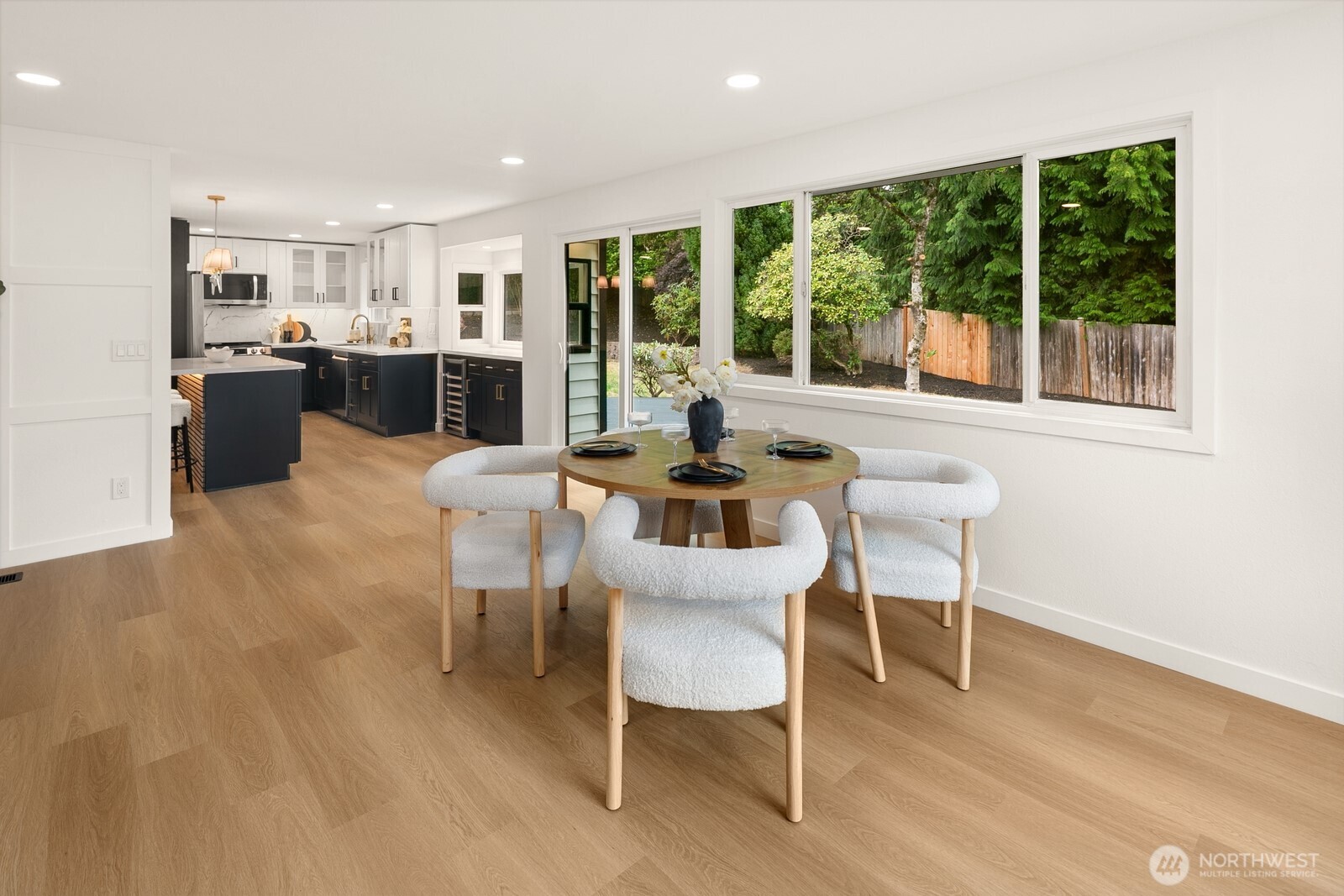 21807 3rd Place West Bothell, WA 98021 - Photo 11 of 32 a dining room with furniture and large windows