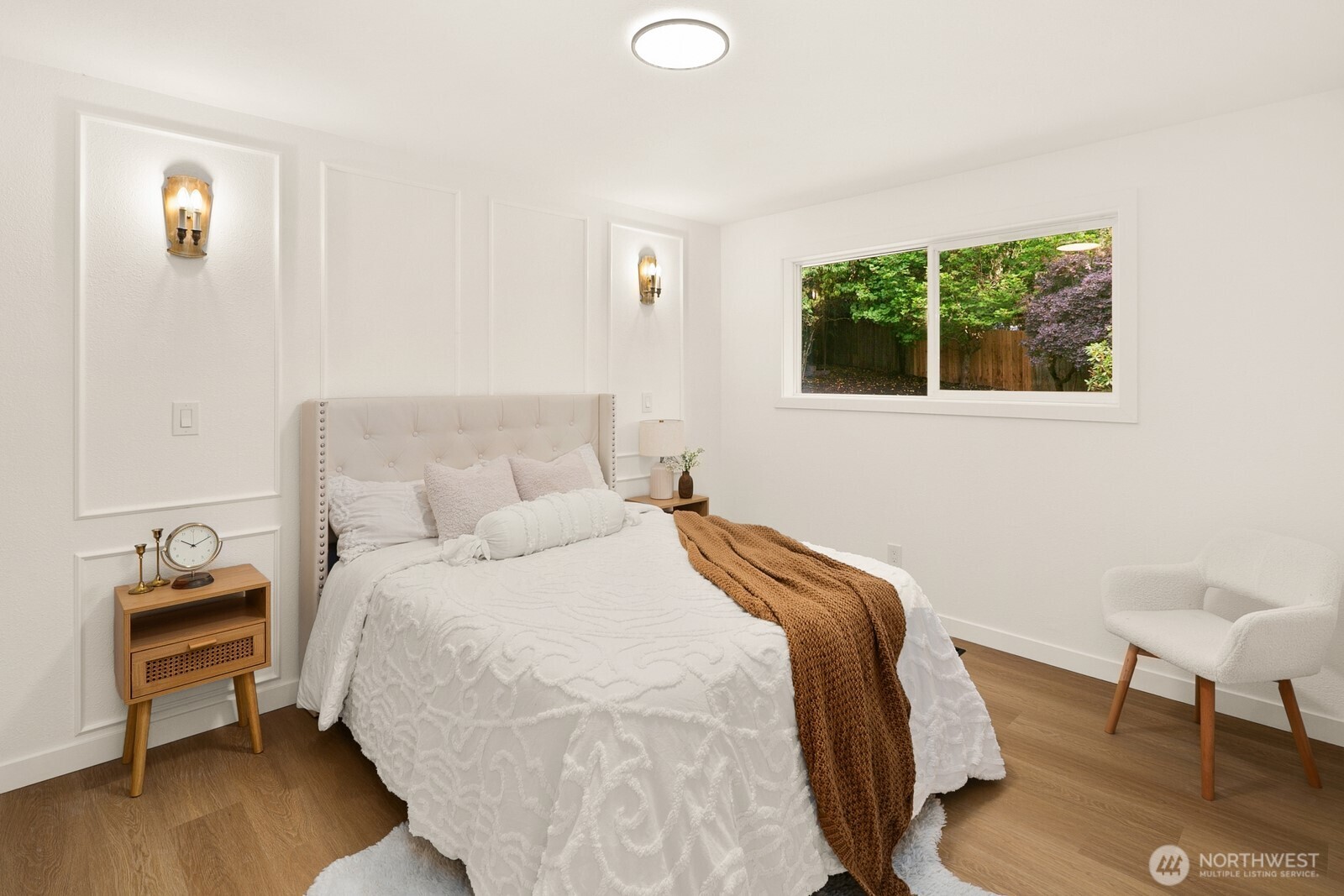 21807 3rd Place West Bothell, WA 98021 - Photo 16 of 32 a bedroom with a bed and a window