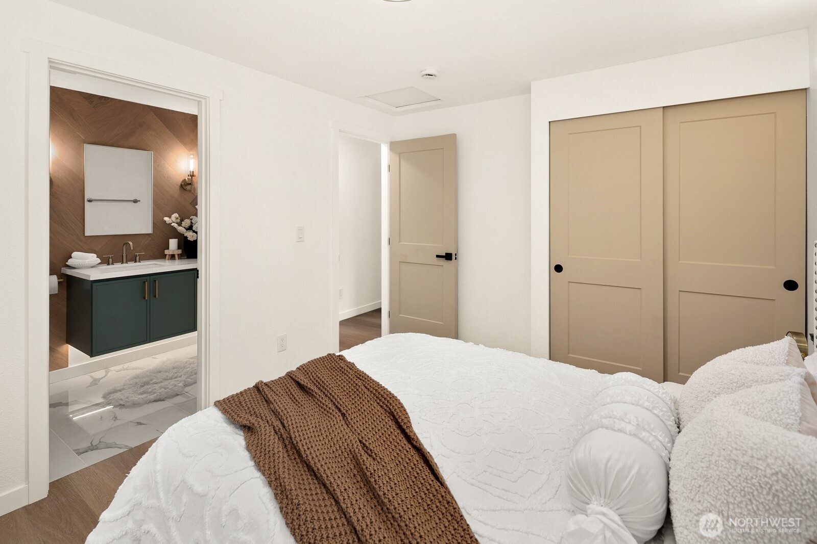 21807 3rd Place West Bothell, WA 98021 - Photo 17 of 32 a bedroom with a bed and a dresser