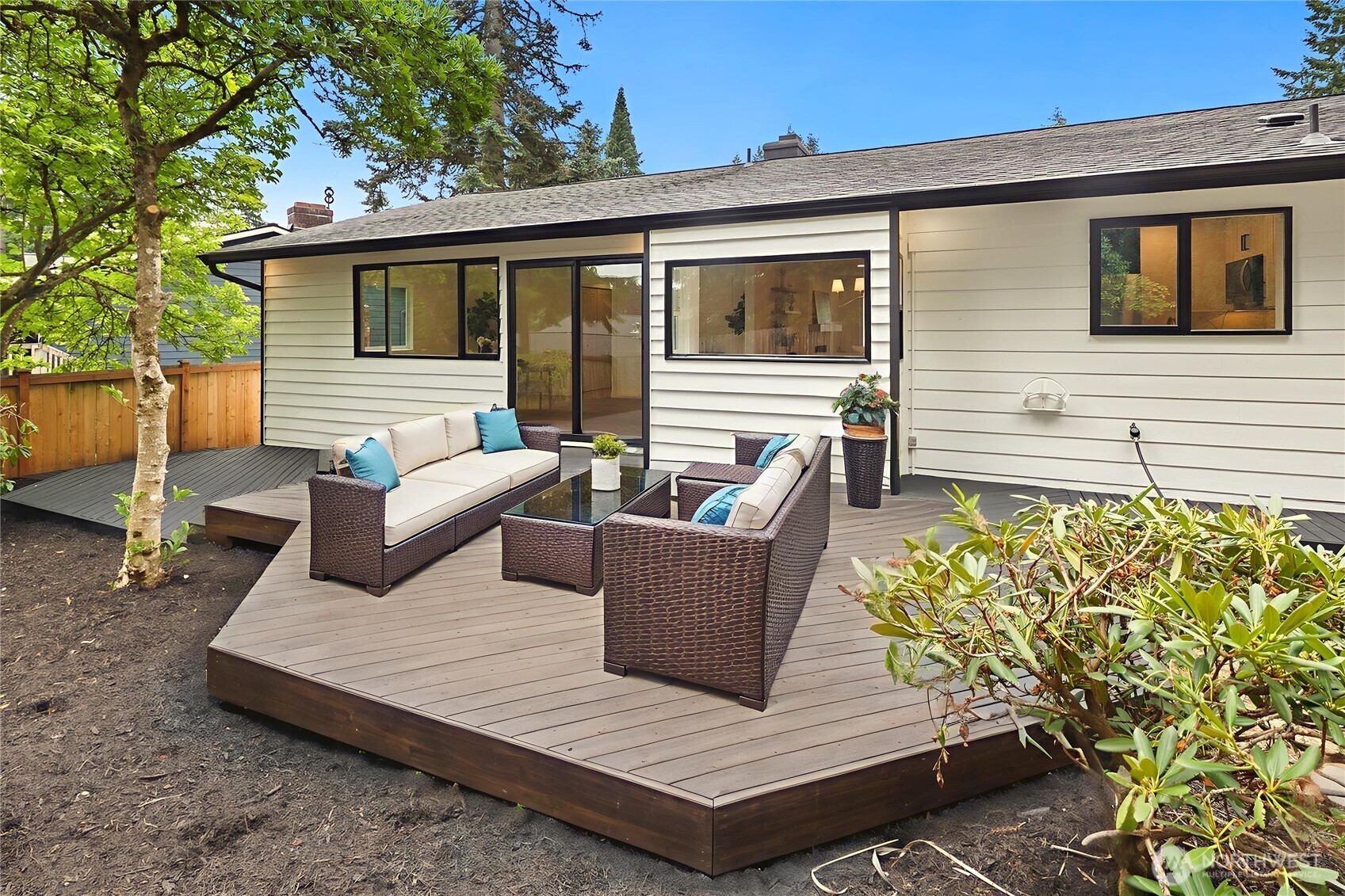 21807 3rd Place West Bothell, WA 98021 - Photo 26 of 32 a view of a wooden deck with furniture