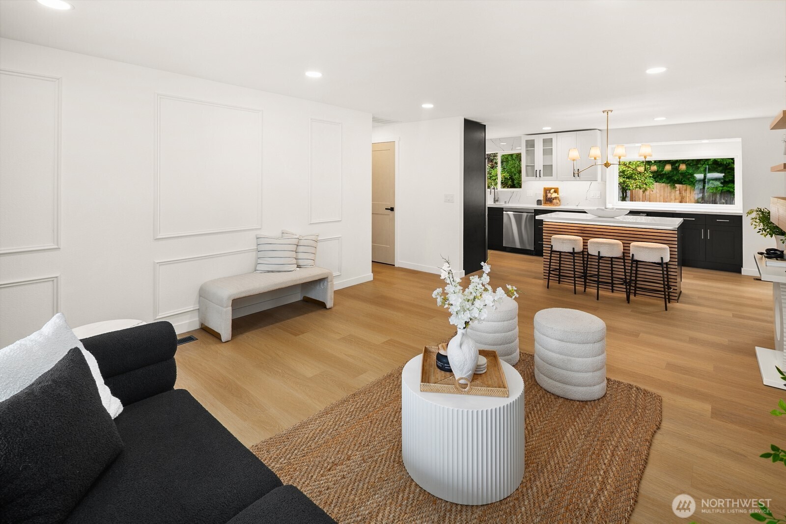 21807 3rd Place West Bothell, WA 98021 - Photo 4 of 32 a living room with furniture and a dining table with kitchen view
