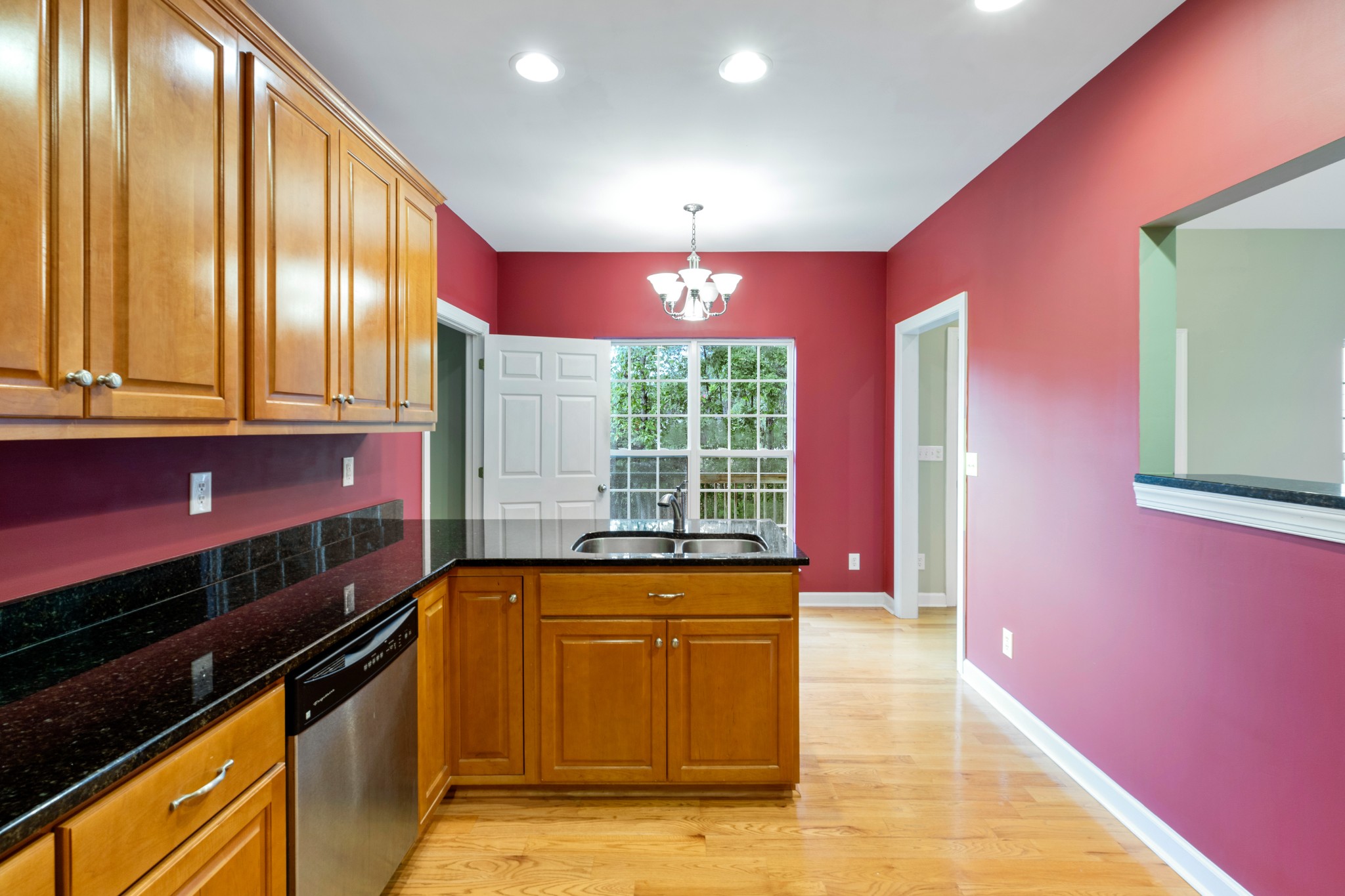 100 Kimberly Way Dickson, TN 37055 - Photo 15 of 34 a kitchen with granite countertop sink stove and cabinets