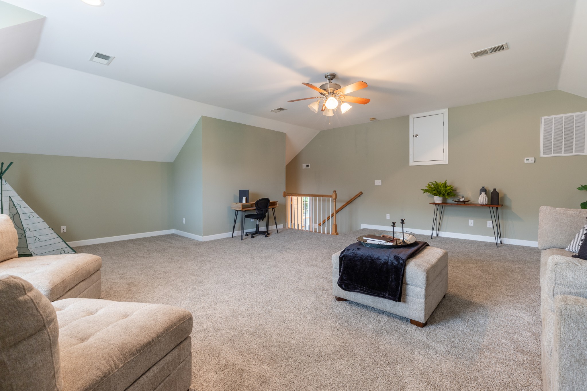 100 Kimberly Way Dickson, TN 37055 - Photo 19 of 34 a living room with furniture a chandelier and a flat screen tv